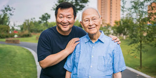 Photo of two men smiling